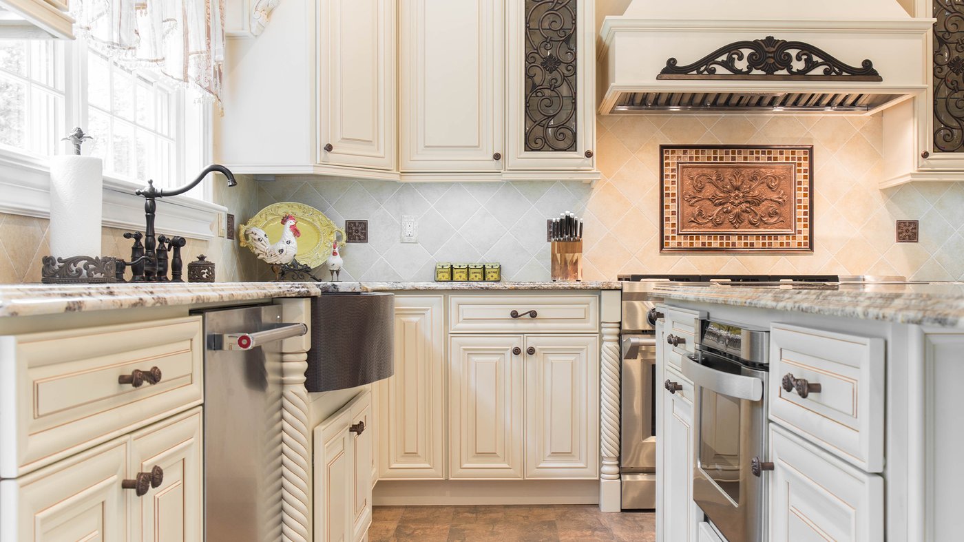 Transitional kitchen by J&K Cabinetry